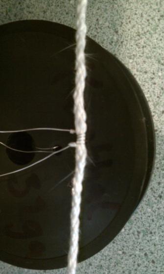 Crimped Wire around Rope Wick