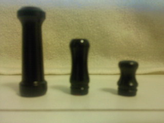 Current tips. Left to right.
Cherry Vapes Cannon 
Obsidian Dream Tip
A shorty style anodized aluminum one I got from NM's First ever vape meet! Free stuff ftw!!