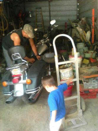 Dan and Mason messing with Harley MC