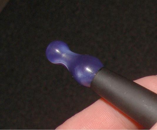 ,,,Dang man, the tip is turned upside down so you can't see the cool swirls..
 Purple "Cherry Vape" pawn tip
 Love me some Cherry vape tips,But I like the Ming style the best..Seems that they're all realy hard to get scratched up .The clean appearance last for a long,long time.And they never get loose while holding a Dct tank down on your cartomizer.No matter what style,They are extremely reliable So I can remove my Dct tanks ,cart,Tip and all and just stick it into a droor or tote. Sometimes I have a few different Dct tanks set up so I can just change to another Dct with a different flavor.