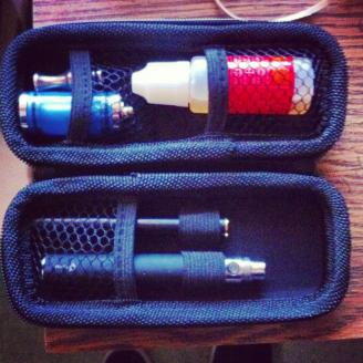 e cig case! With my Manual 1000Mah Tornado Battery, My automatic battery. Titan 20ml 18 MG Redbull Flavor. Drip Tip, and DCT tank :)