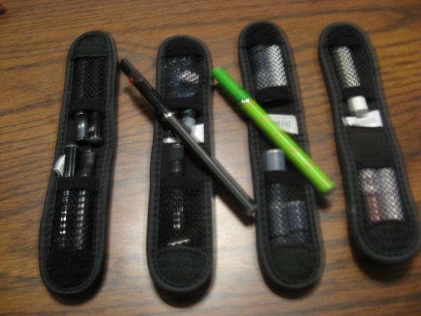 Flash Drive E cig Cases 003Flash Drive case your can pick up at an office supply store make perfect E cig Cases.  

I usually carry an 801, 901, Nebula or Vapor King and a super mini
