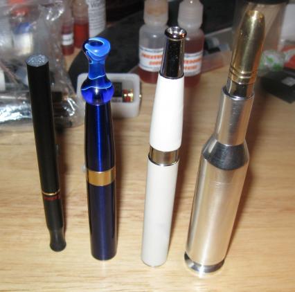 From left tp right, a standard manual 510, a 650mah eGo, a 900mah eGo, and the Calibre.