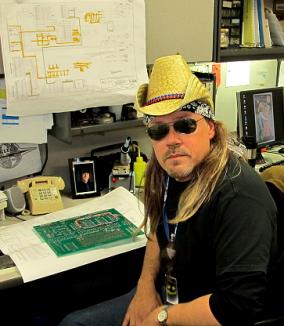 haloween at the office. I wouldn't ordinarily wear sunglasses at my desk. I'll let you guess if the hair is real.