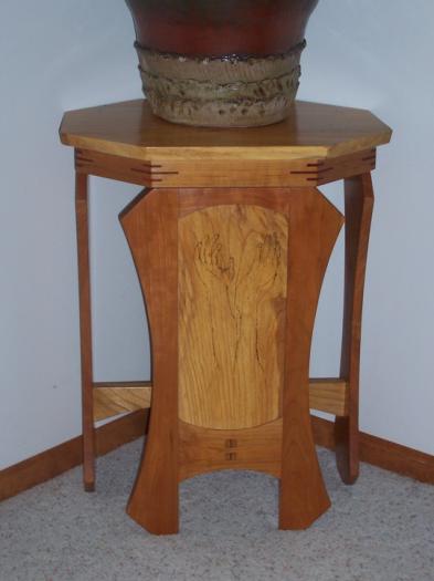 Here's an art stand made specifically for a certain ceramic vessel.