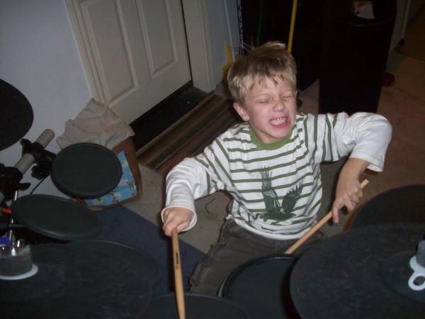 Huston playing a very complex polyrythm... a one e and a two e and a three 3 and a 4566787765arrrghhhhh!!!