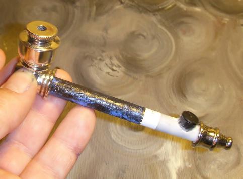 I wanted to do something special with the xhale02 that got me to officially quit smoking 2 weeks ago. What a better way than attaching it to a pipe (bought it this afternoon) and creating a dripper set-up. I can use this to try all the new liquids i want to get =)