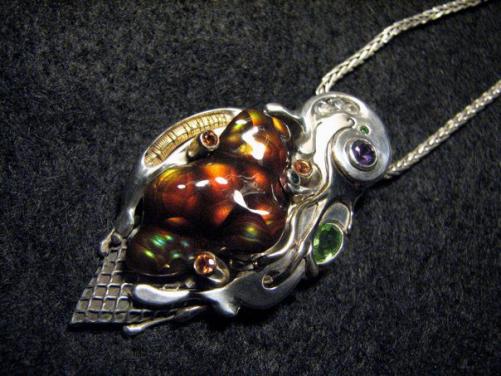 Ice Cream in the Fall~ Hand Carved Fire Agate with various faceted gem accents, 22 gold wire-wrapped accents...100% hand faricated.