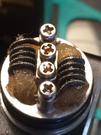 IMG 0745 26 gauge kanthal with .5x1mm ribbon wrapped under 34 ga nichrome 60 clapton