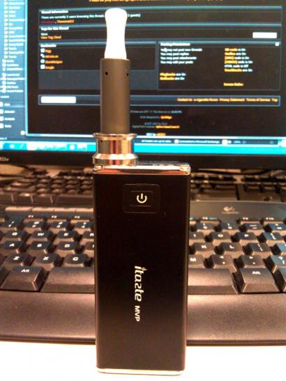 iTaste MVP with a Cisco Spec atomizer, drip shield and ceramic drip tip.