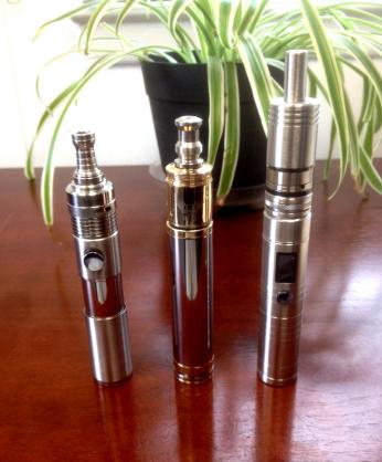 Left to right: Atmizoo Roller with a Helios dual coil dripper, EHPro Caravela with a Patriot dual coil dripper and a Sigelei Zmax V5 with a Fogger V2.5