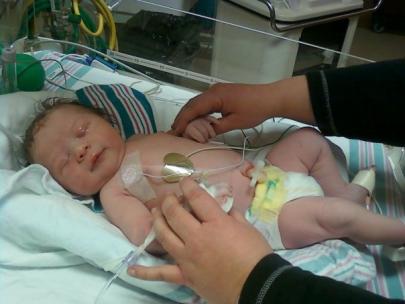 Me & A on C-section day!  He was HUGE! 8lbs 3oz. His mom was out of it... in the operating room she wanted to either name him after the anesthesiologist or ketamine LOL