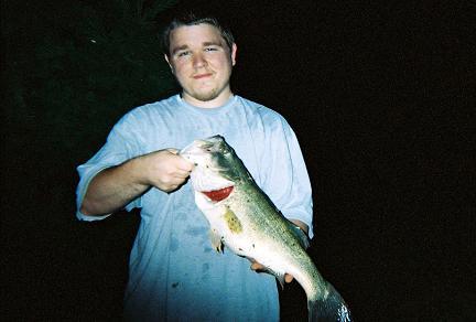 Me and a 21 inch largemouth bass I caught.