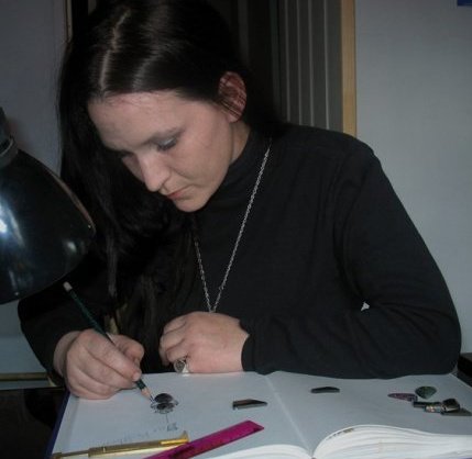 Me sketching for a client (all my designs come from hand drawn sketches)
