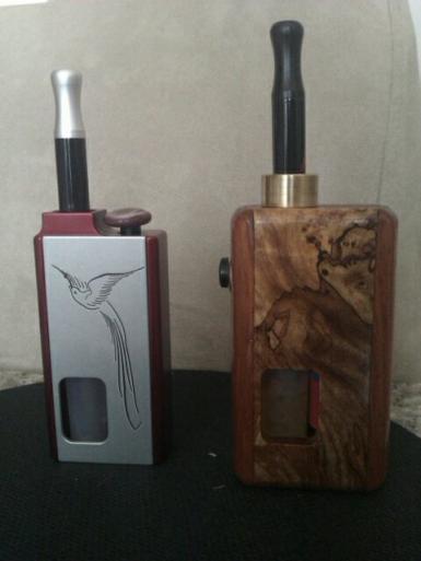 Mini and Mini Woodville. 

Mini extras are not permanent - the bird is a rub on, and the button is a sculpty clay thing I added with temporary mounting putty because the little button made indentations in my finger. 

Mini Woodville is a jatoba / spalted maple burl.
