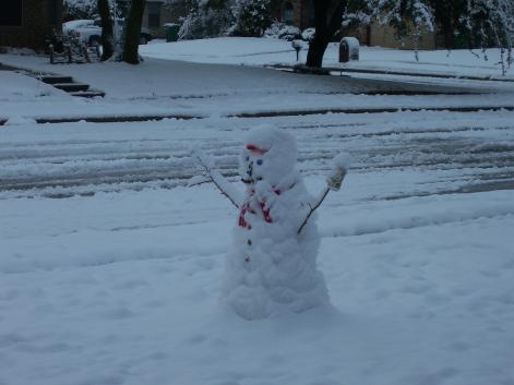 Mr Snowman stayed out in the snow all night.