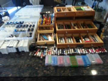 Much of my gear spread out on counter. Some DIY concentrates on left, Rebuildable tools center, and APV Box right