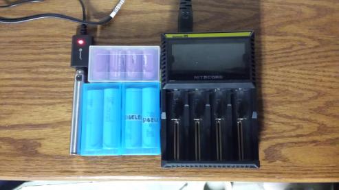 My battery charger, and current batteries.
Four Efest 18650 Purple, Four Samsung INR 25R 18650. Still waiting on my MNKE's