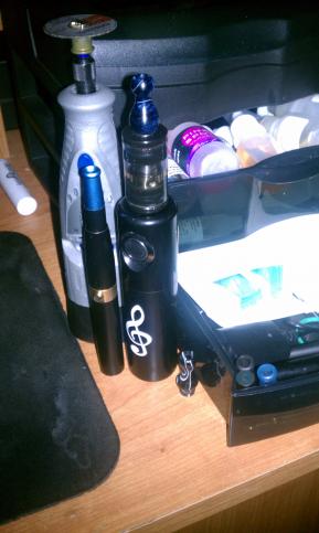 My dremel purchased just to make holes, and my lil drawers of vapey stuff...
