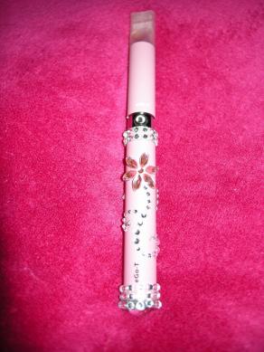 My first attempt at "blingin" my pink ego-T pv. There's a diamond in the middle of the button too! :D