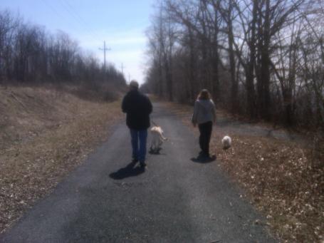My Hubs and our youngest walking the pups =)