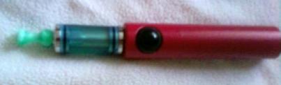 My latest additions, blue DCT with 1.5ohm carto on a red bolt, TrustFire  18650 2000mAh 3.7V battery with a vase style drip tip. March 2012
