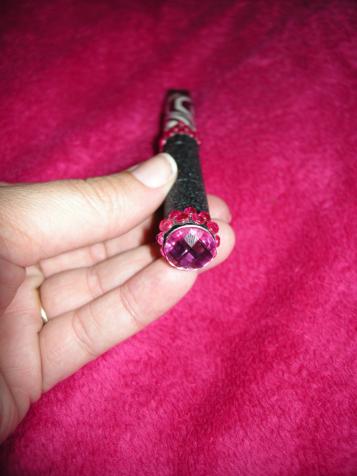 Of course there's a hot pink jewel on the end!!! :D