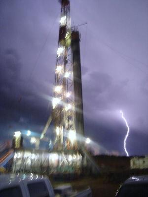 Patterson Drilling Rig 73! Up on floor tripping pipe.