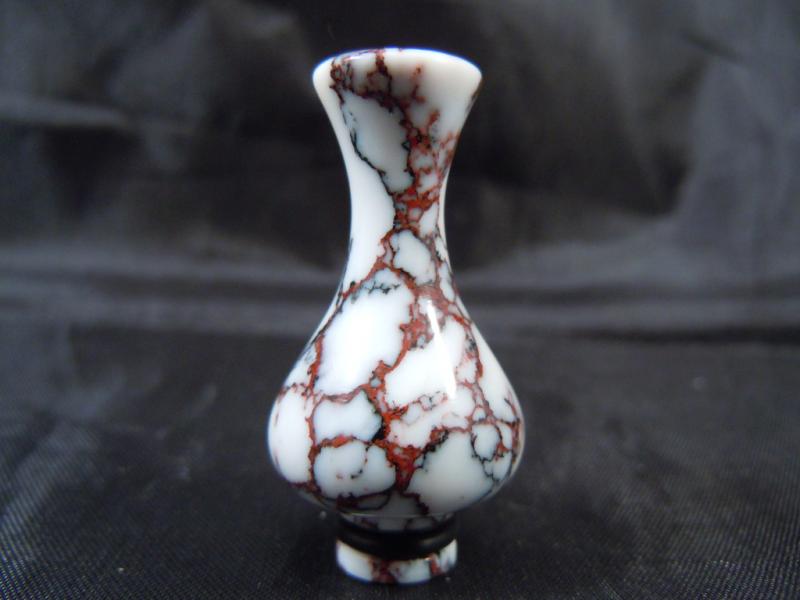 red swirls 50