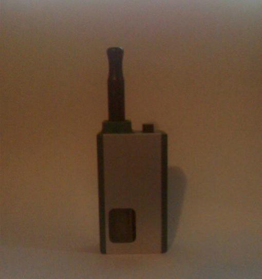 Reo Mini green/silver with bauway 2.5ohm atomizer and black anodized aluminum drip-tip.
