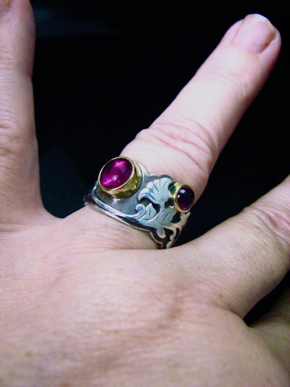 rubellite tourmaline in 18k:sterling scrollwork