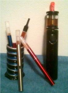 Several 510's with XL Tanks, one 510 with a Sapphire tank,  homemade ecig stand.  Silver Bullet with Liquinator.