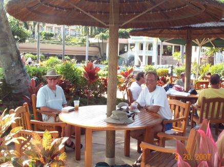 Sitting around sneak'n peeks at the chicks while waiting for some grub at the poolside cafe in Kauai