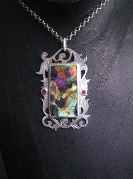 Spectrolite Scrollowrk reversible pendant with Pink sapphire accents side 1