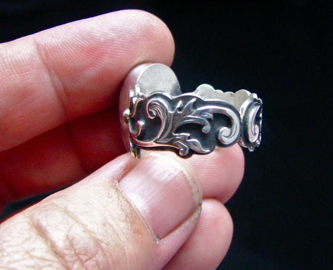 sugilite scrollwork detail