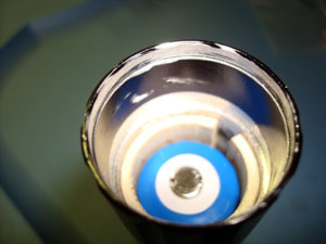 The battery and PVC spacer. I shaved the PCB board diameter down so that it will fit inside the smaller diameter portion of the tube and rest on top of the PVC spacer. This will give me more room in the head and a tighter battery contact.