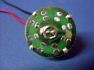 The board ready to go in. I cut the Neg. circuit to the center, as you can see at the 3 o'clock position.