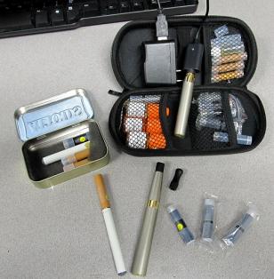 The ego kit, old Njoy Npro and travel cases