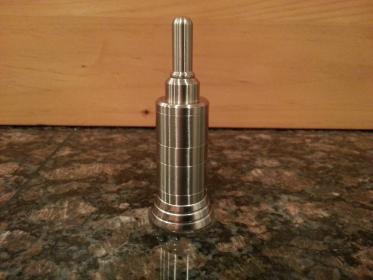 The is the finished Kayfun. Chose all metal this day, on my second 2.0 Ohm coil build, as I was having a bit of leaking with the clear tank tube. The metal has not leaked. What a tank! Sitting atop the Siam Mods Tank Holder.
