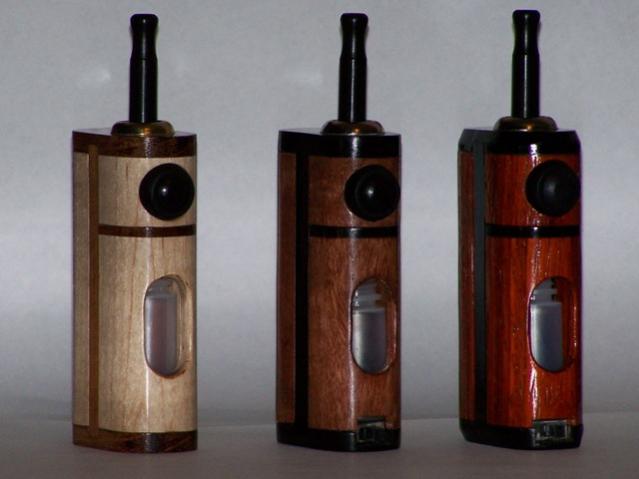 Three Ali'is
========
Left:     Cherry Spine / Maple Doors
Middle: Ebony Spine  / Bubinga Doors
Right:   Ebony Spine  / Padauk Doors