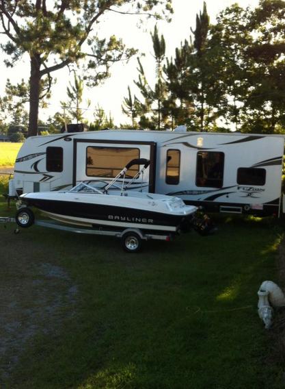 Toy Hauler Camper (for all the big girl toys) and matching boat