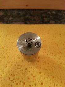 Upside down, showing the 510 connection and the eliqued fill screw. Remove the screw and use a needle nose bottle or Ucan. Like the Kayfun 3.0, and does not require the plastic fill needle as does the Kayfun 3.1.