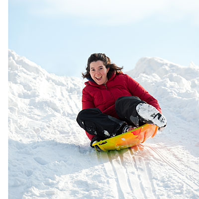 woman-sledding-park-400x400.jpg