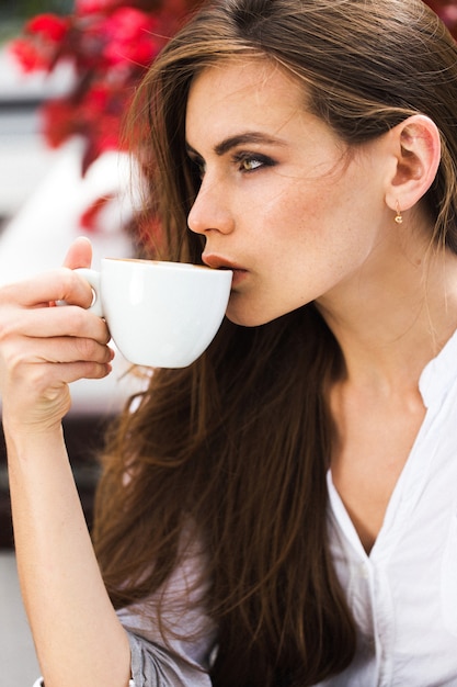 pretty-lady-drinks-coffee_1304-5065.jpg