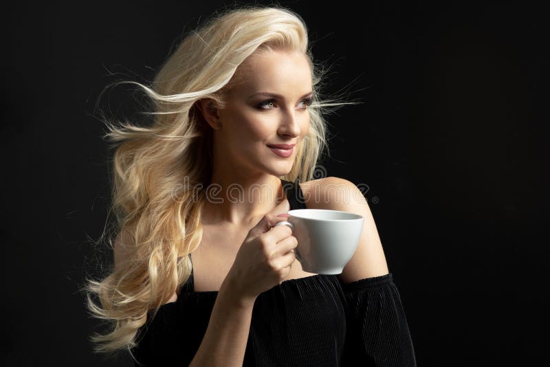 beauty-woman-coffee-cup-hold-blonde-144842013.jpg