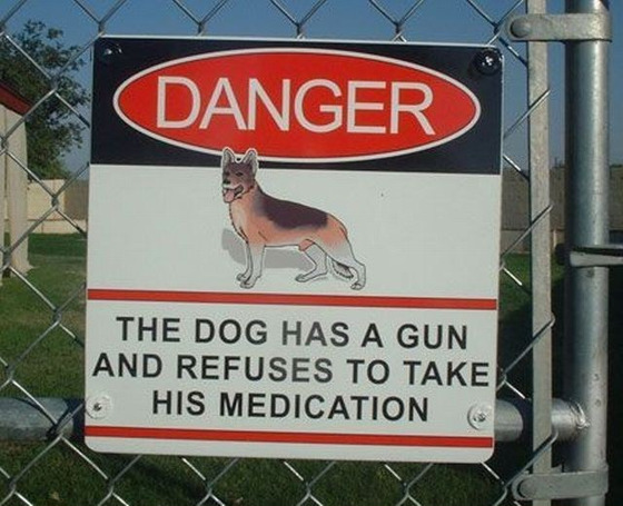 sign_dog-has-a-gun.jpg