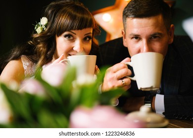 bride-groom-drinking-coffee-cafe-260nw-1223246836.jpg