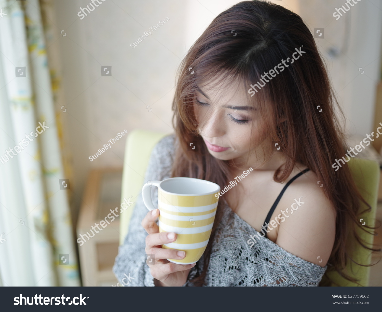 stock-photo-sexy-woman-drinking-coffee-627759662.jpg