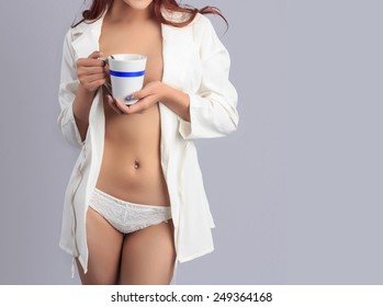 sexy-body-woman-holding-coffee-260nw-249364168.jpg