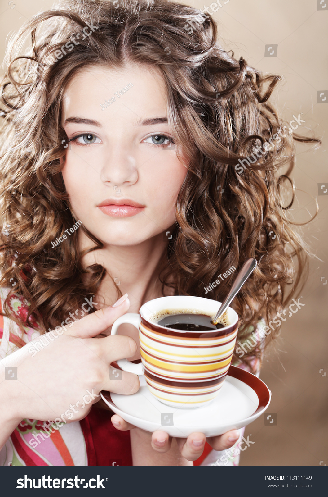 stock-photo-young-pretty-woman-drinking-coffee-113111149.jpg